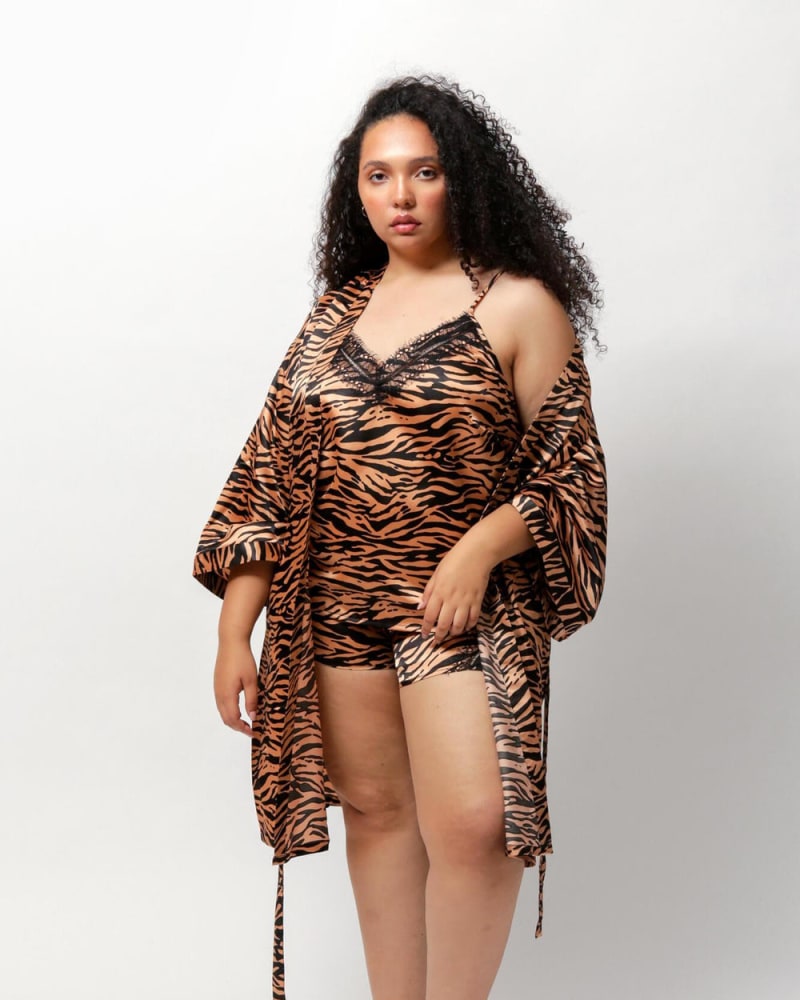 Front of a model wearing a size L (12/14) Nicolette Satin Sleep Short in Tiger Print by LuvMeMore. | dia_product_style_image_id:266578